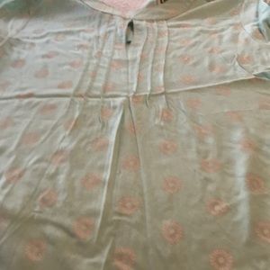 Aqua green and cream blouse